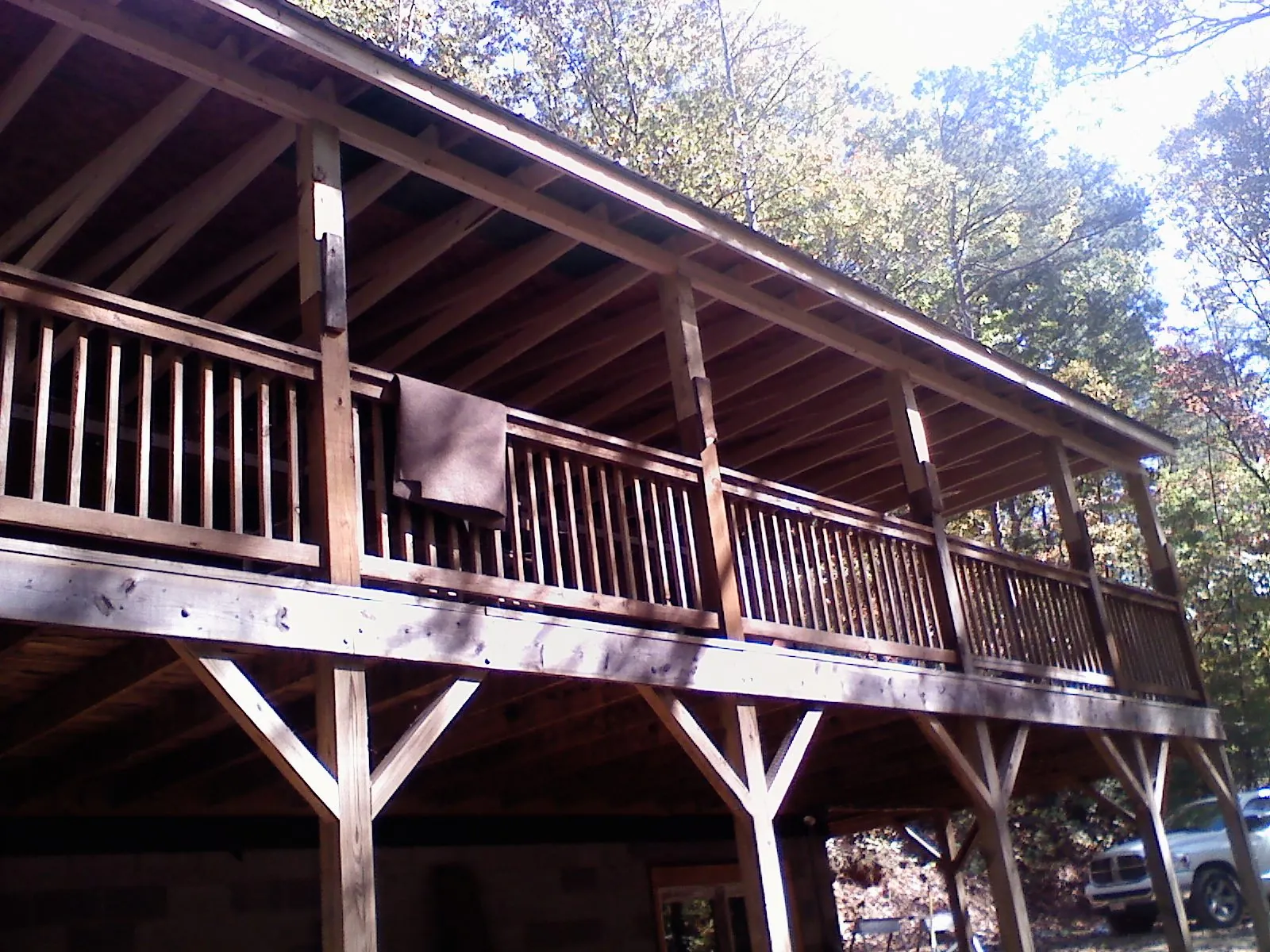 Timber framing under a new elevated porch and deck — Roof Leak Repair in New Galilee by Roofing Brothers